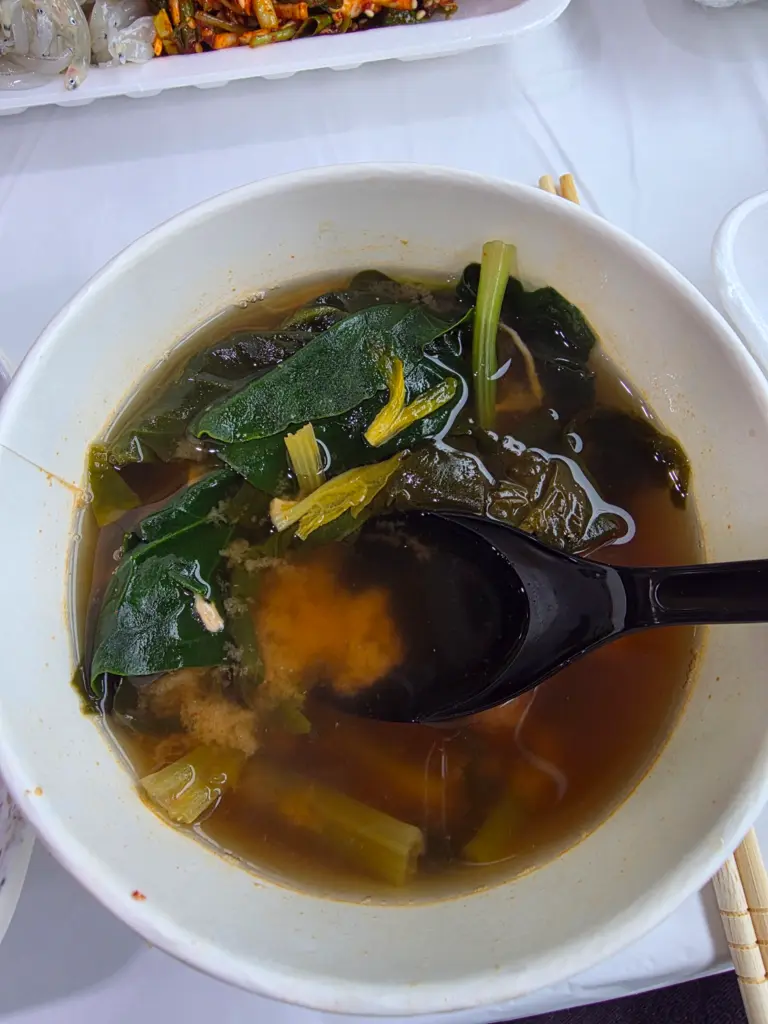 Seaweed soup served with a seafood meal at Jango Port Silchi Festival